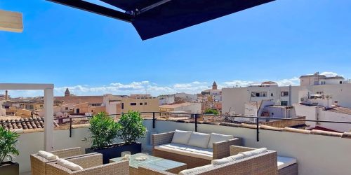 Elegant Historic Penthouse with Panoramic Rooftop Views in Palma